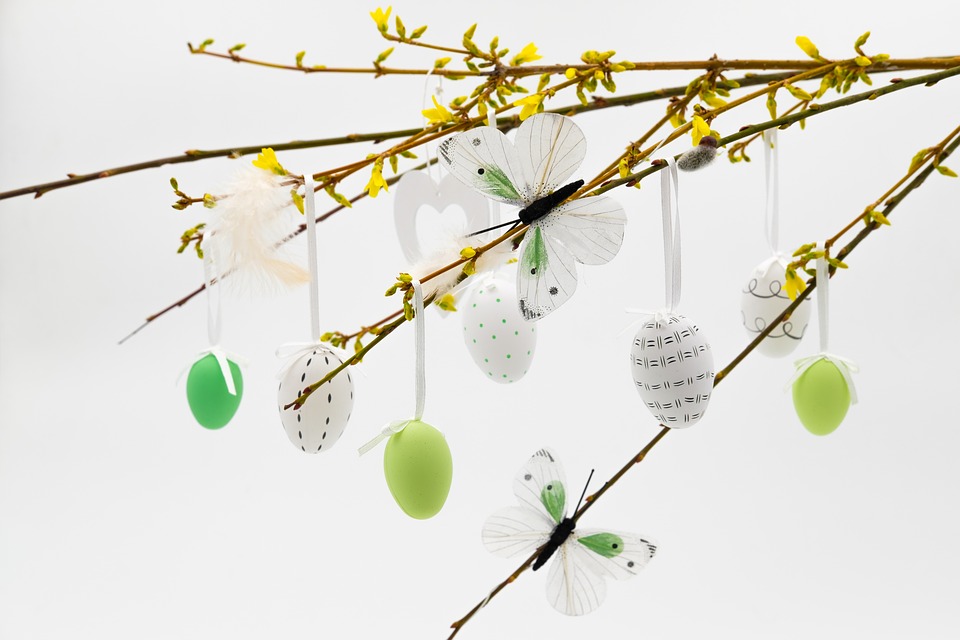 A selection of eggs hanging from an Easter tree.